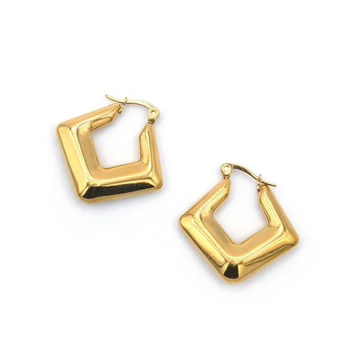 Kultaiset romboidut vannekorvakorut